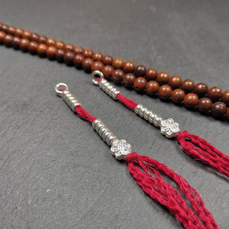 5mm Sterling Silver Prayer Bead Counters with Lucky Knot Pendant - Tibetan Buddhist art, close-up detail