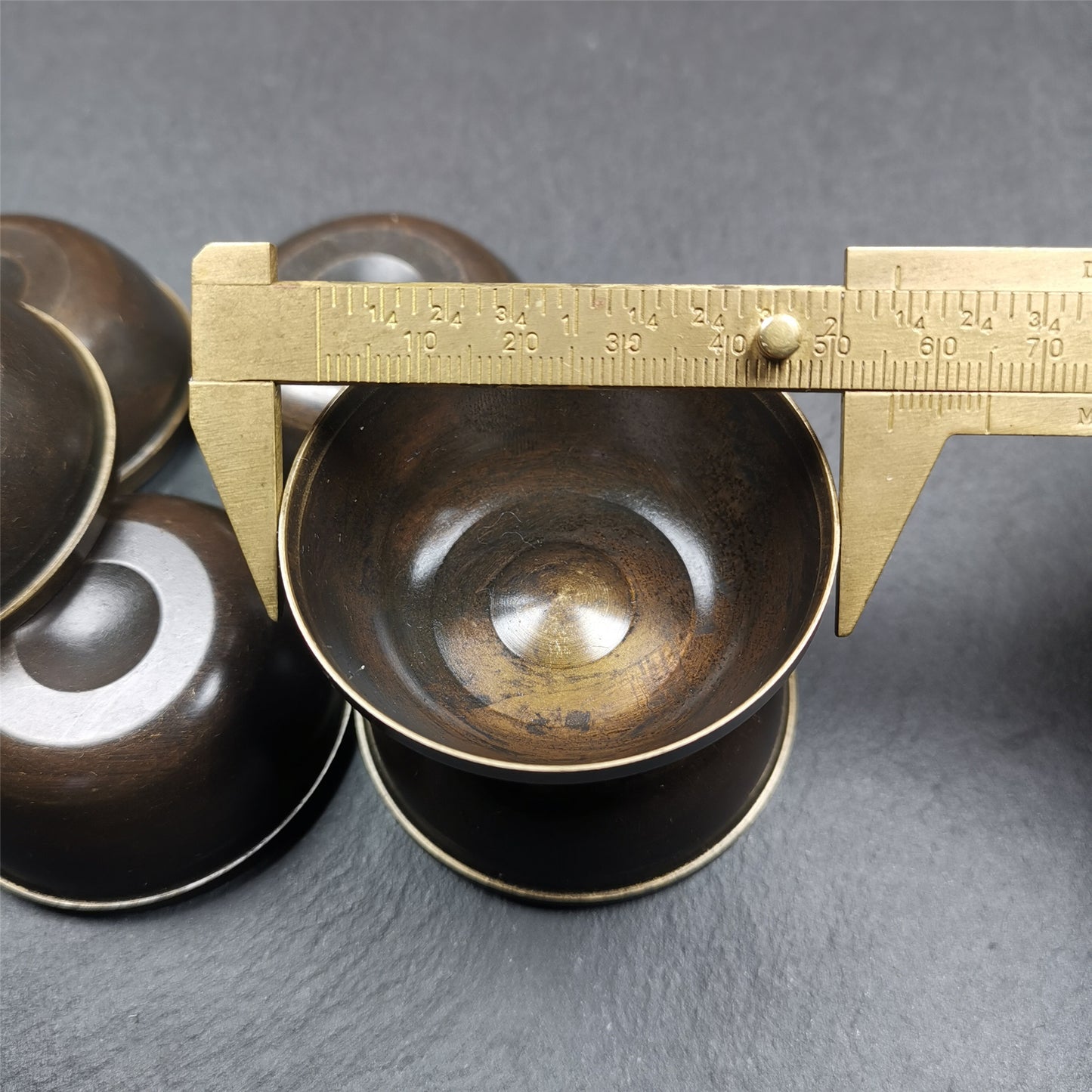 This set of tibetan water offering bowls are handmade by Tibetan craftsmen from Tibet. ABOUT Offering Bowls The most common type of offering on Tibetan Buddhist shrines are made with seven water offering bowls — called “yonchap” in Tibetan.