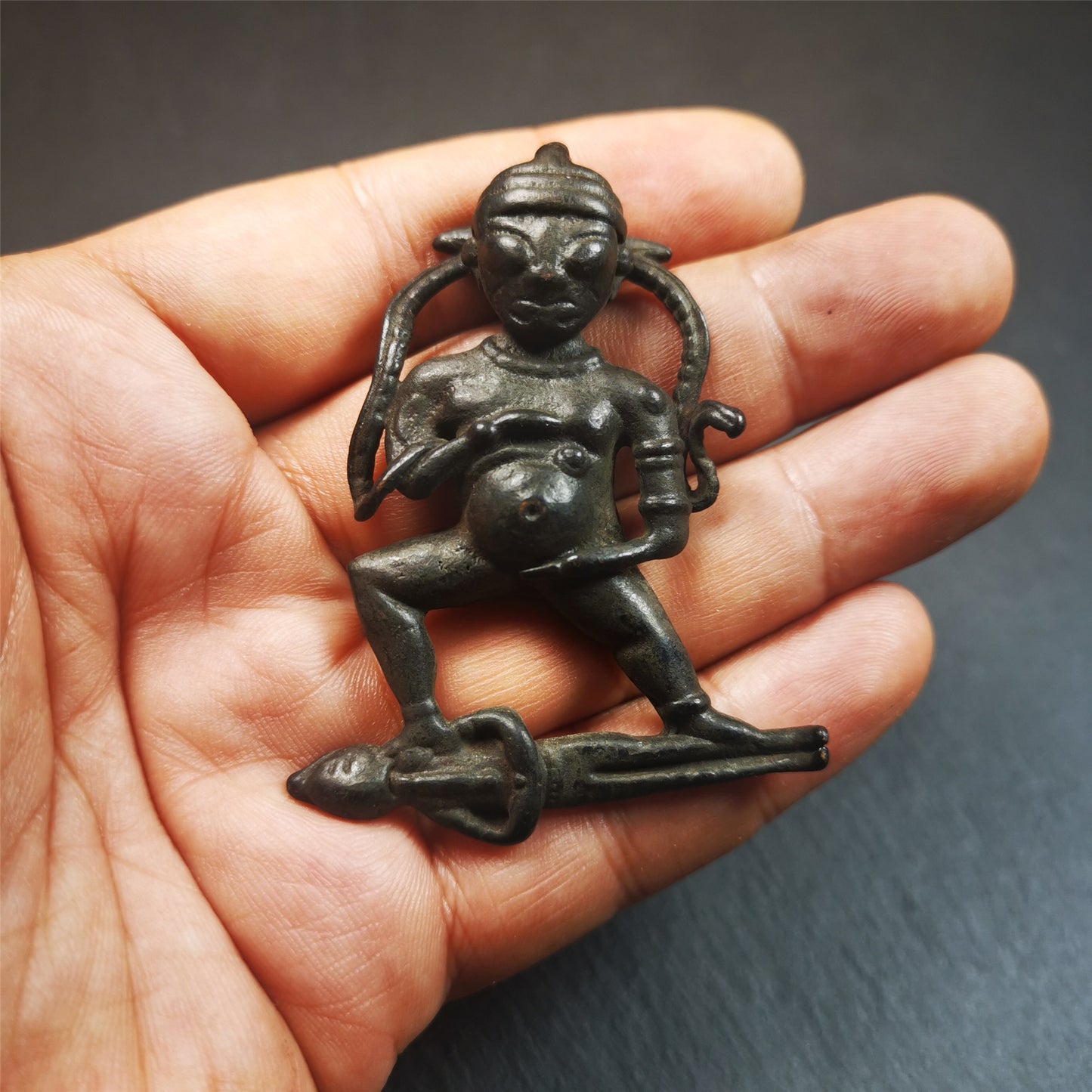 This Black Jambhala(Dzambhala) statue was collected from Goinqên goinba Monastery,Dege Tibet,about 40 years old. It is handmade of thokcha,black color,2.17 inches height and 1.38 inches width. He is the God of Wealth in Tibetan Buddhism. 