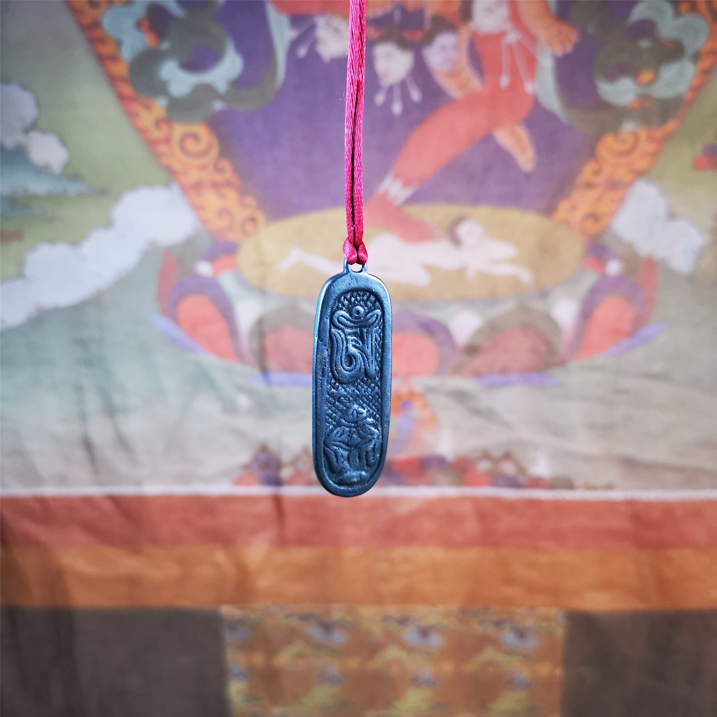 This unique Vajra pendant are collected from Yaqing Monastery,handmade of copper. It has a vajra on the front and the OM mantra of Tibetan Buddhism and the eight treasures tribute on the back. You can make them into necklace, or keychain.