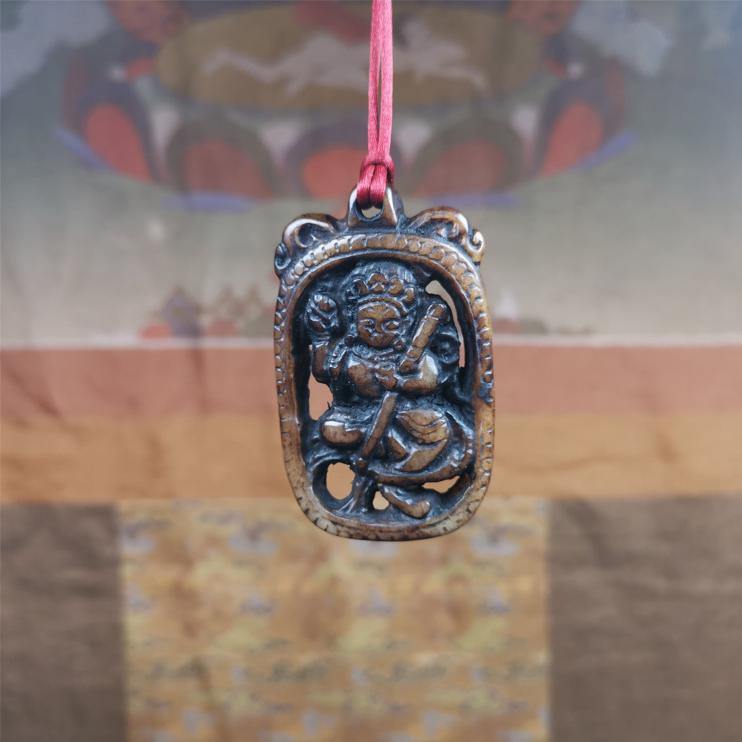 This Troma Nagmo amulet was collected from Gerze Tibet, hand carved by Tibetan Craft man. It is made of yak bone,brown color,size is 2.16" × 1.3". You can make it necklace,or just put into your shrine. Troma Nagmo literally means the Black Wrathful Lady. She is included in the Dharmapala pantheon as a form of Vajravarahi. She is also the feminine embodiment of w