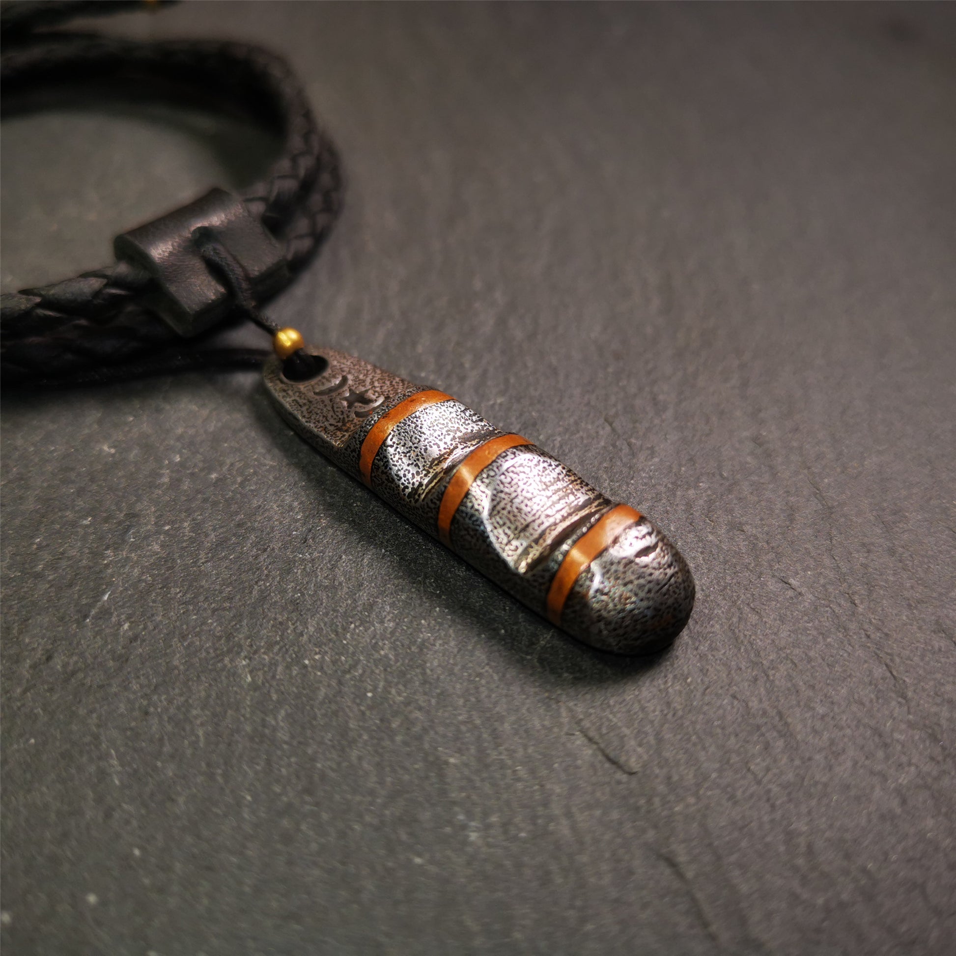 This unique Ladder pendant is made by Tibetan craftsmen. It is made of cold iron and copper, black color,the shape is Tibetan Ladder of Heaven,length is 46mm. You can make it into a pendant,keychain, or just put it on your desk,as an ornament.