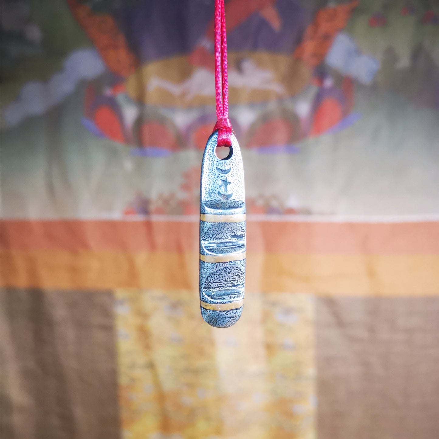 This unique Ladder pendant is made by Tibetan craftsmen. It is made of cold iron and copper, black color,the shape is Tibetan Ladder of Heaven,length is 46mm. You can make it into a pendant,keychain, or just put it on your desk,as an ornament.