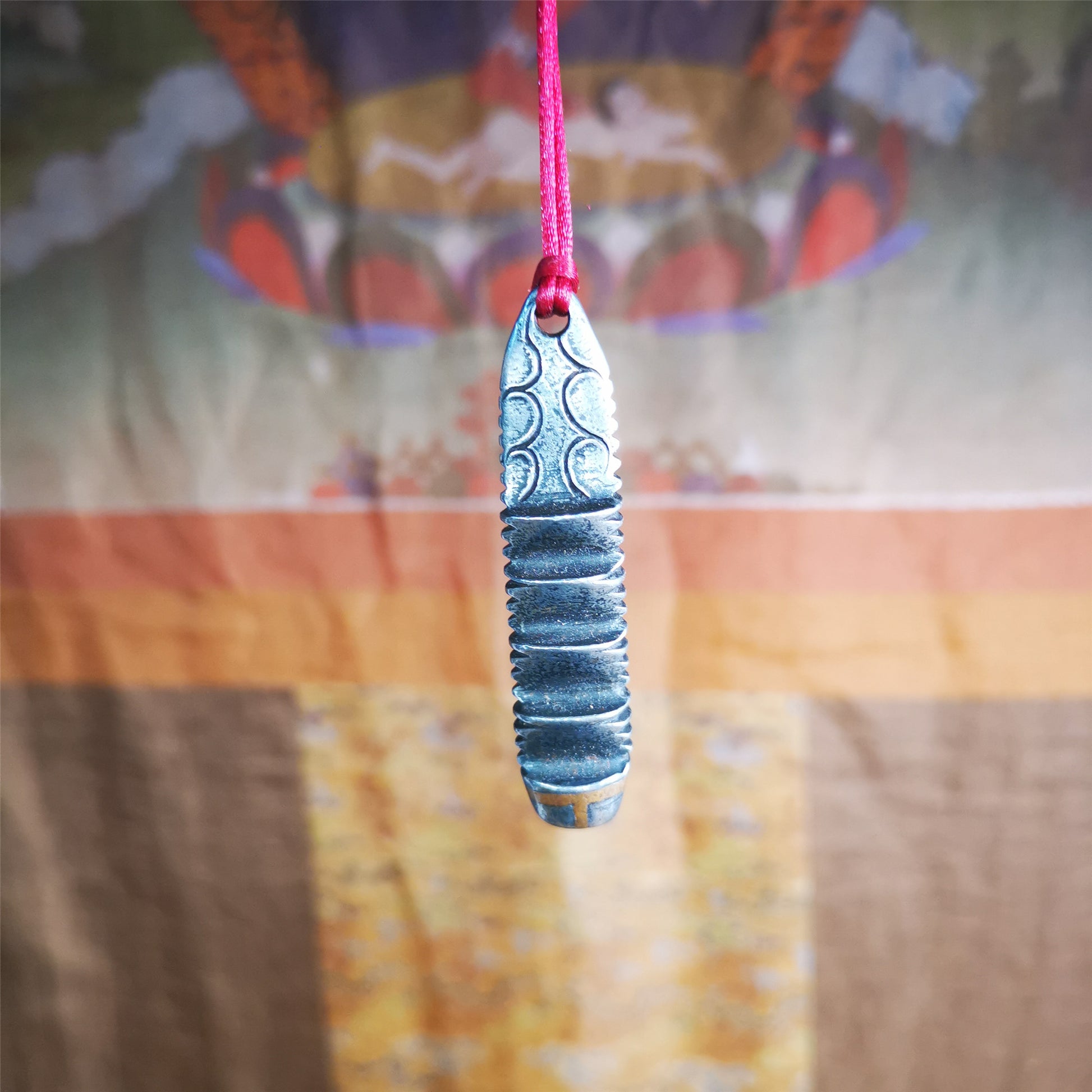 This unique Ladder pendant is made by Tibetan craftsmen in Hepo Township, Baiyu County. It is made of cold iron and copper, black color,the shape is Tibetan Ladder of Heaven,length is 60mm. You can make it into a pendant,keychain, or just put it on your desk,as an ornament.