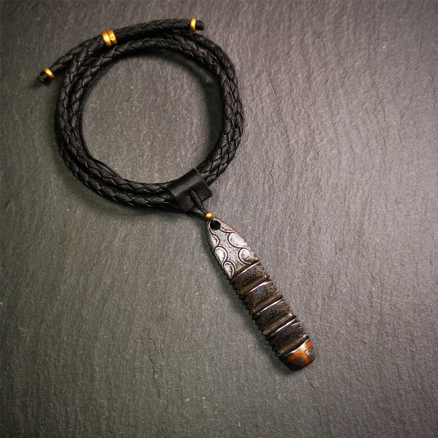 This unique Ladder pendant is made by Tibetan craftsmen in Hepo Township, Baiyu County. It is made of cold iron and copper, black color,the shape is Tibetan Ladder of Heaven,length is 60mm. You can make it into a pendant,keychain, or just put it on your desk,as an ornament.