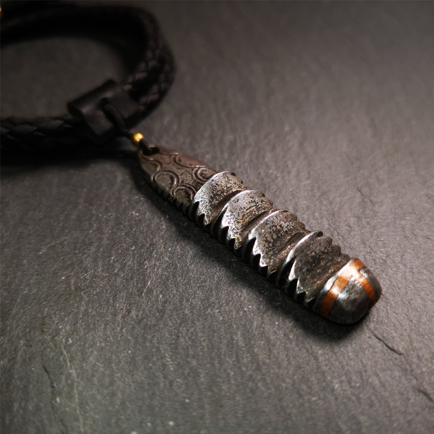 This unique Ladder pendant is made by Tibetan craftsmen in Hepo Township, Baiyu County. It is made of cold iron and copper, black color,the shape is Tibetan Ladder of Heaven,length is 60mm. You can make it into a pendant,keychain, or just put it on your desk,as an ornament.