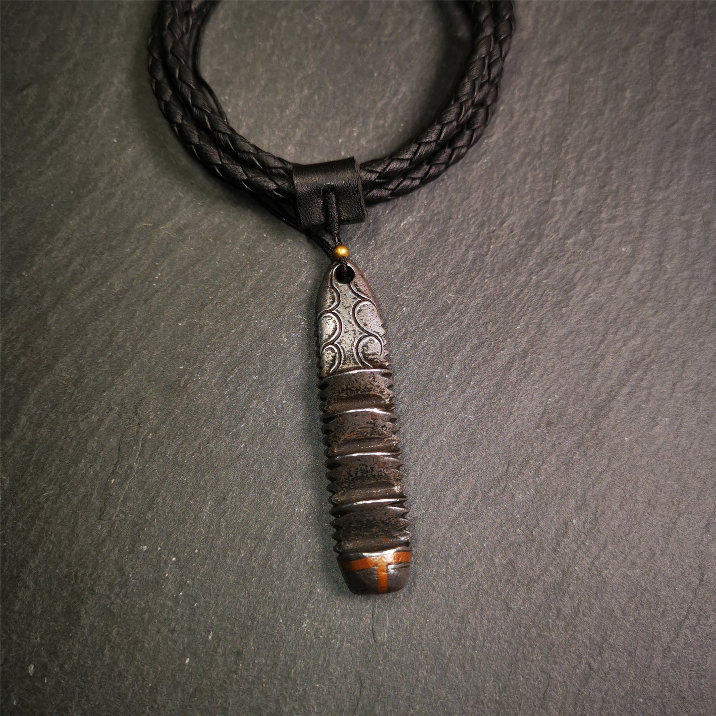 This unique Ladder pendant is made by Tibetan craftsmen in Hepo Township, Baiyu County. It is made of cold iron and copper, black color,the shape is Tibetan Ladder of Heaven,length is 60mm. You can make it into a pendant,keychain, or just put it on your desk,as an ornament.