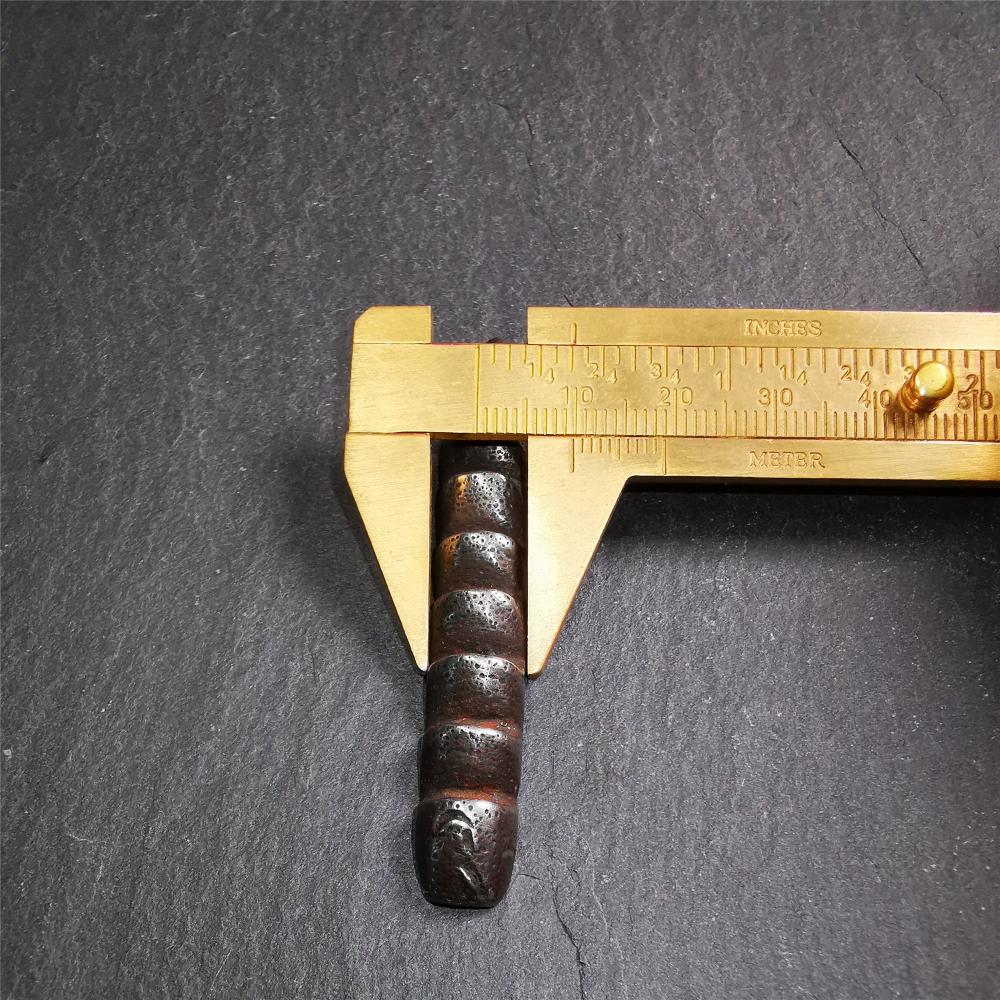 This unique Ladder pendant is made by Tibetan craftsmen. It is made of cold iron and copper, black color,the shape is Tibetan Ladder of Heaven,length is 66mm. You can make it into a pendant,keychain, or just put it on your desk,as an ornament.