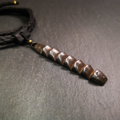 This unique Ladder pendant is made by Tibetan craftsmen. It is made of cold iron and copper, black color,the shape is Tibetan Ladder of Heaven,length is 66mm. You can make it into a pendant,keychain, or just put it on your desk,as an ornament.