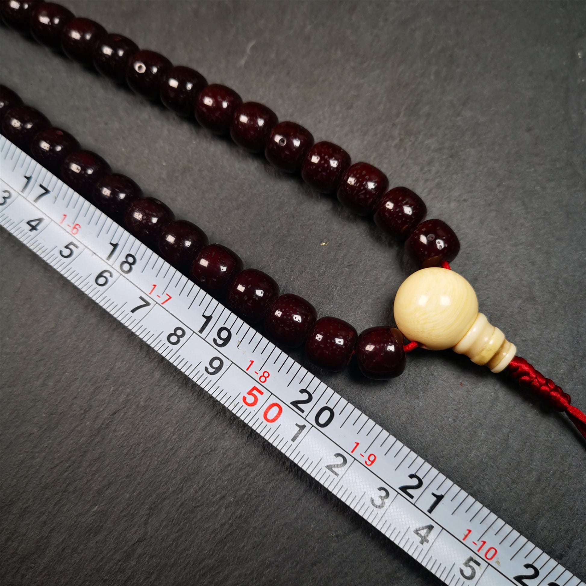 This mala is made by Tibetan craftsmen and come from Hepo Town, Baiyu County,Tibet, the birthplace of the famous Tibetan handicrafts. It's composed of 108 pcs 10mm lotus seed beads,with agate and turquoise beads.