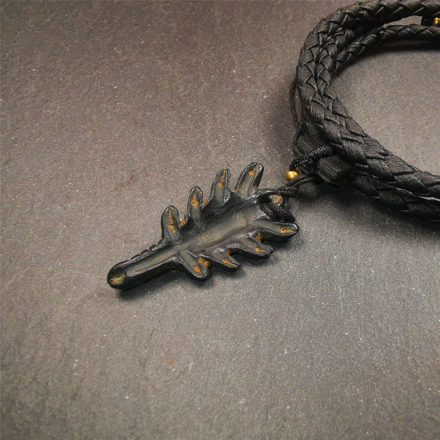 This unique obsidian carved Scorpion Guru pendant is made by Tibetan craftsmen in Hepo Township, Baiyu County, the birthplace of the famous Tibetan handicrafts. It's made of obsidian,black color,1.38 inch height. You can make it into necklace,or mala pendant.