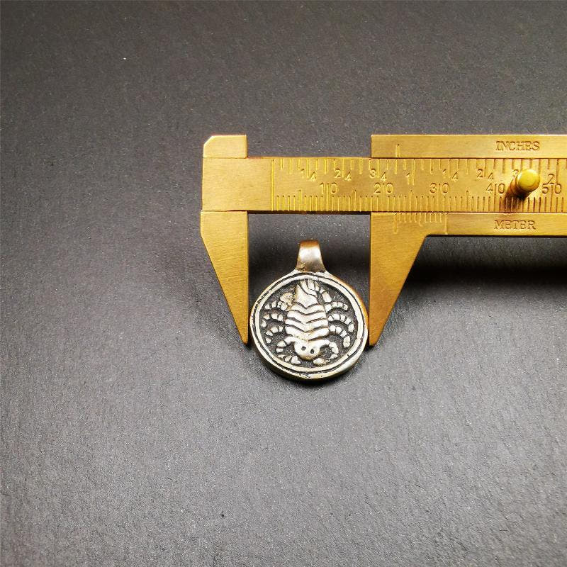 Scorpion Guru Amulet 0.87" - Tibetan Buddhist amulet, size reference