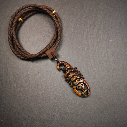 This unique bone carved Scorpion Guru pendant is made by Tibetan craftsmen in Hepo Township, Baiyu County, the birthplace of the famous Tibetan handicrafts. It's carved yak bone,brown color,2.2 inch height. You can make it into necklace,or mala pendant.