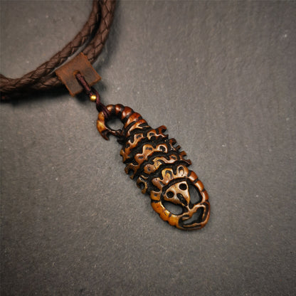 This unique bone carved Scorpion Guru pendant is made by Tibetan craftsmen in Hepo Township, Baiyu County, the birthplace of the famous Tibetan handicrafts. It's carved yak bone,brown color,2.2 inch height. You can make it into necklace,or mala pendant.