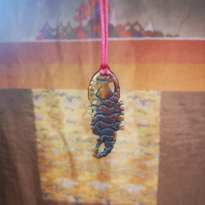 This unique bone carved Scorpion Guru pendant is made by Tibetan craftsmen in Hepo Township, Baiyu County, the birthplace of the famous Tibetan handicrafts. It's carved yak bone,brown color,2.2 inch height. You can make it into necklace,or mala pendant.