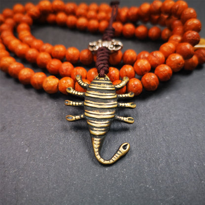 This scorpion amulet is collect from Baiyu Tibet,it is made of brass,yellow color,size is 1.57 inch. You can make it into a necklace pendant, bag hanging,keychain, or just put it on your desk,as an ornament.