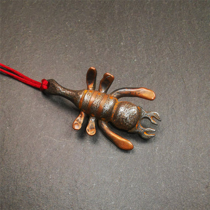 This scorpion is handmade by Tibetan craftsmen in Hepo Township, Baiyu County, the birthplace of the famous Tibetan handicrafts. It is made of cold iron,black color, the shape is scorpion guru (from Guru Rinpoche), use the copper inlaid and carved craftsmanship. The eight legs of this scorpion are carved from copper and are inlaid in a body made of thunder iron,a beautiful pattern on the abdomen of the scorpion, exquisite and beautiful craftsmanship.