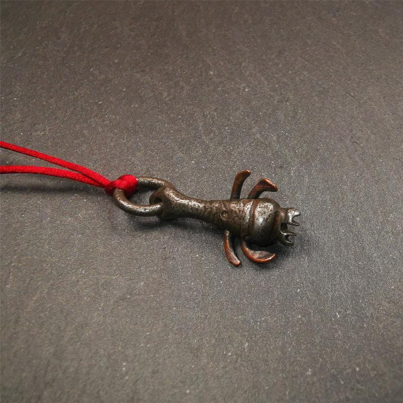 Scorpion Guru Amulet 1.26" - Tibetan Buddhist amulet, close-up detail