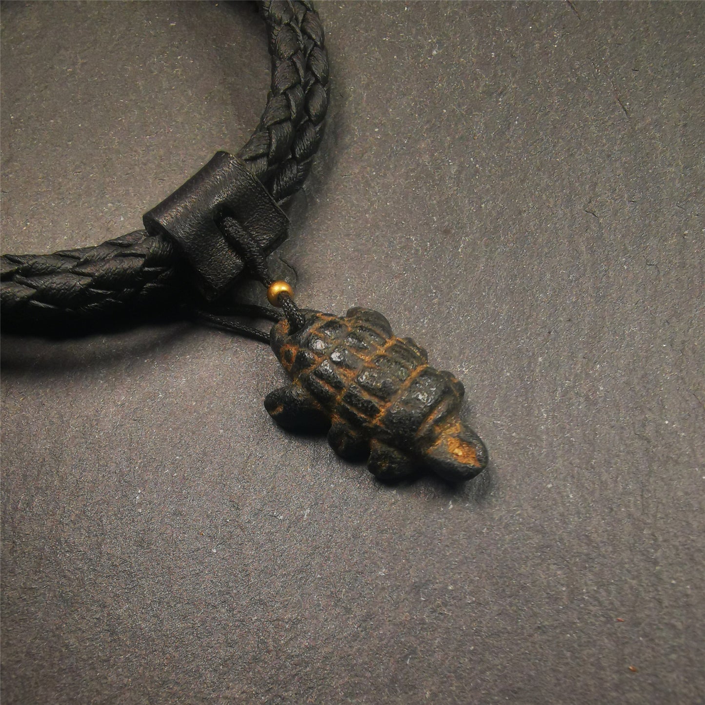 This unique obsidian carved Scorpion Guru pendant is made by Tibetan craftsmen in Hepo Township, Baiyu County, the birthplace of the famous Tibetan handicrafts. It's made of obsidian,black color,1.1 inch height. You can make it into necklace,or mala pendant.