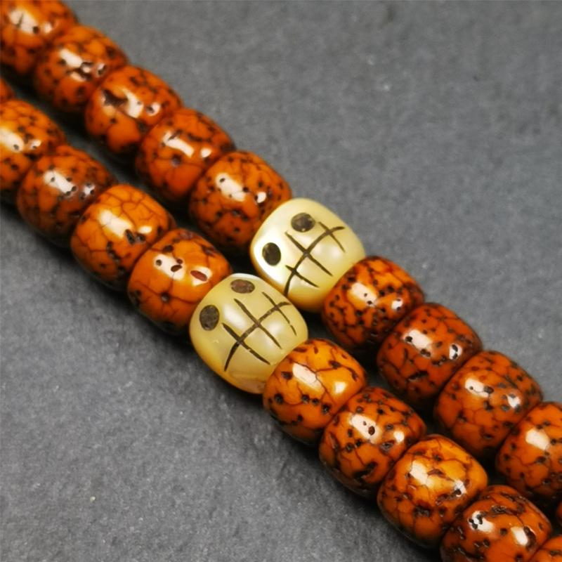 1 Pair of Fish Bone Skull Beads 0.3" - Tibetan Buddhist art, front view