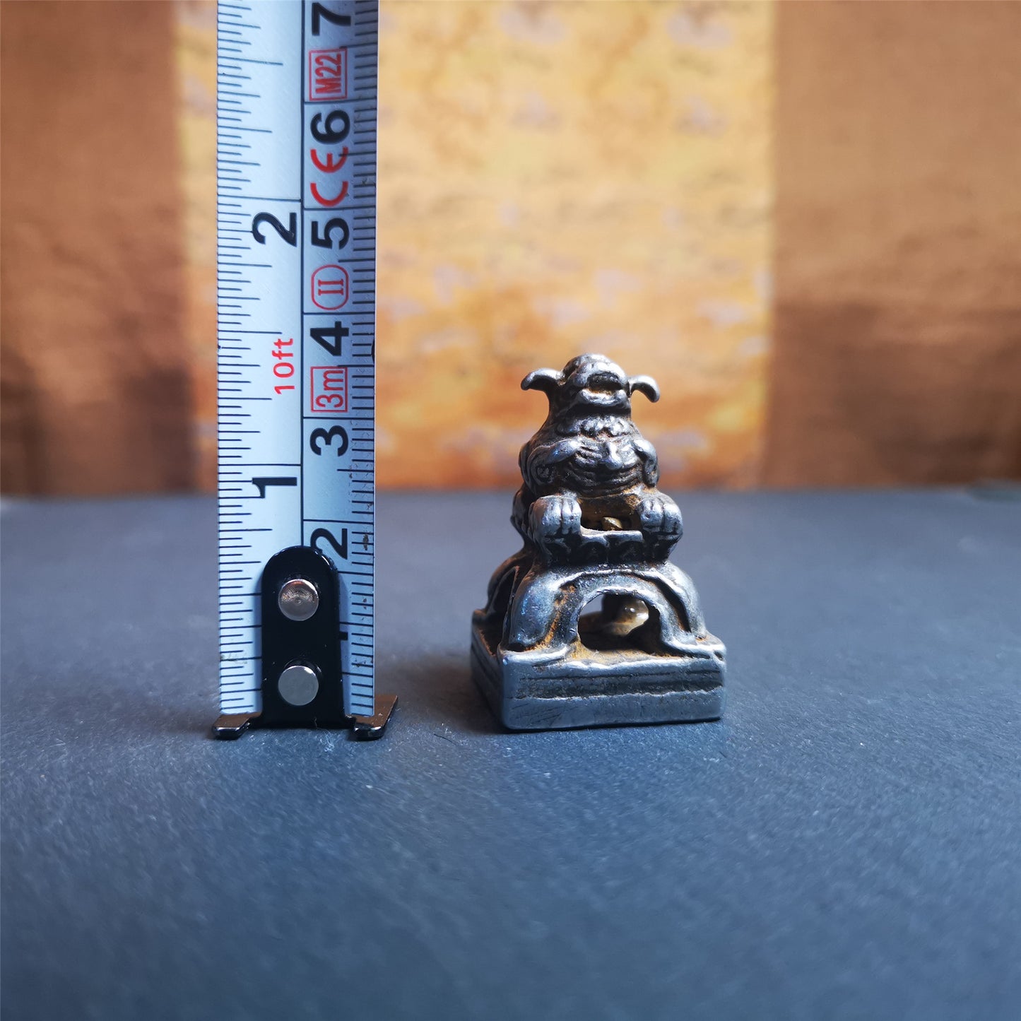 This antique seal was collected from Derge,Tibet,about 30 years old. It is made of cold iron,carved Snow Lion Shape, and  Stupa symbol seal on the bottom,size is 1.38 inches.