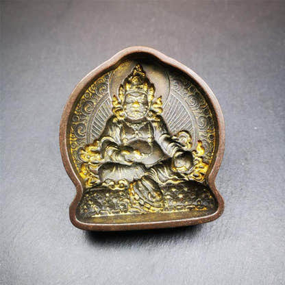 Yelllow Jambhala Tsa Tsa Mold - Tibetan tsa tsa mold, close-up detail