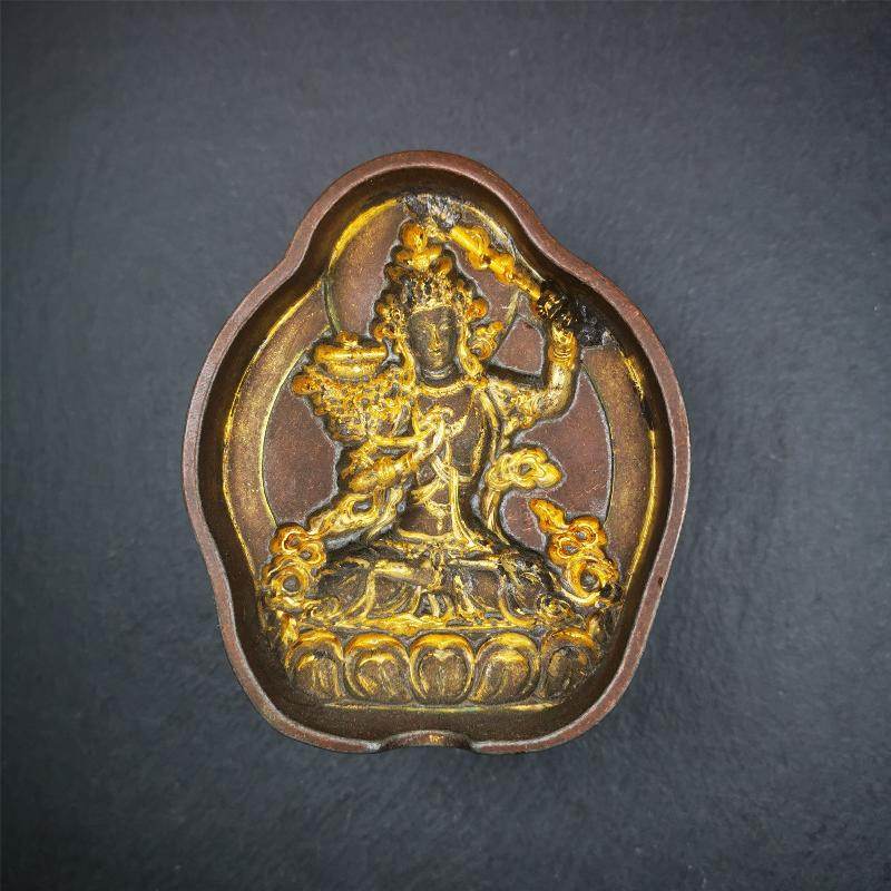 Manjusri Tsa Tsa Mold - Tibetan tsa tsa mold, close-up detail