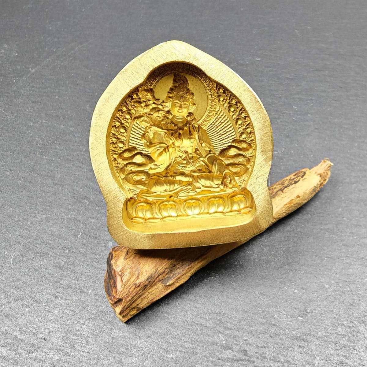 White Tara Tsa Tsa Mold - Tibetan tsa tsa mold, close-up detail