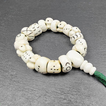 Tibetan Conch Shell Wrist Mala Bracelet - Tibetan Buddhist mala beads, close-up detail