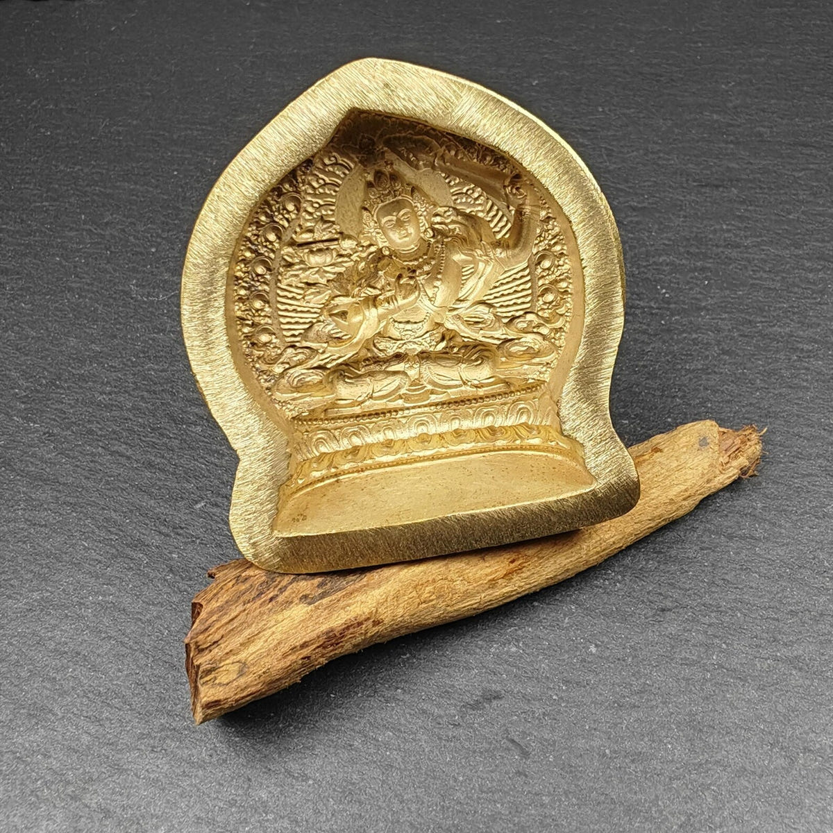 Yellow Manjusri Tsa Tsa Mold - Tibetan tsa tsa mold, close-up detail