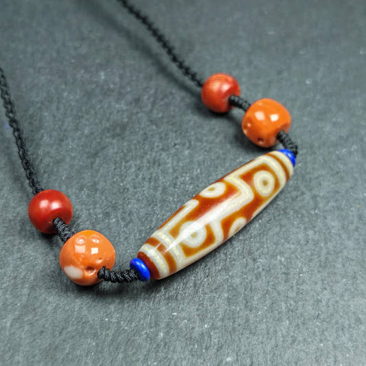 Vintage Tibetan 9 Eye Dzi Bead Necklace - Tibetan Buddhist bead necklace, front view