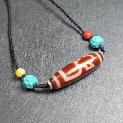 Authentic Fire Agate God of Wealth Dzi Necklace - Tibetan Buddhist bead necklace, detailed view