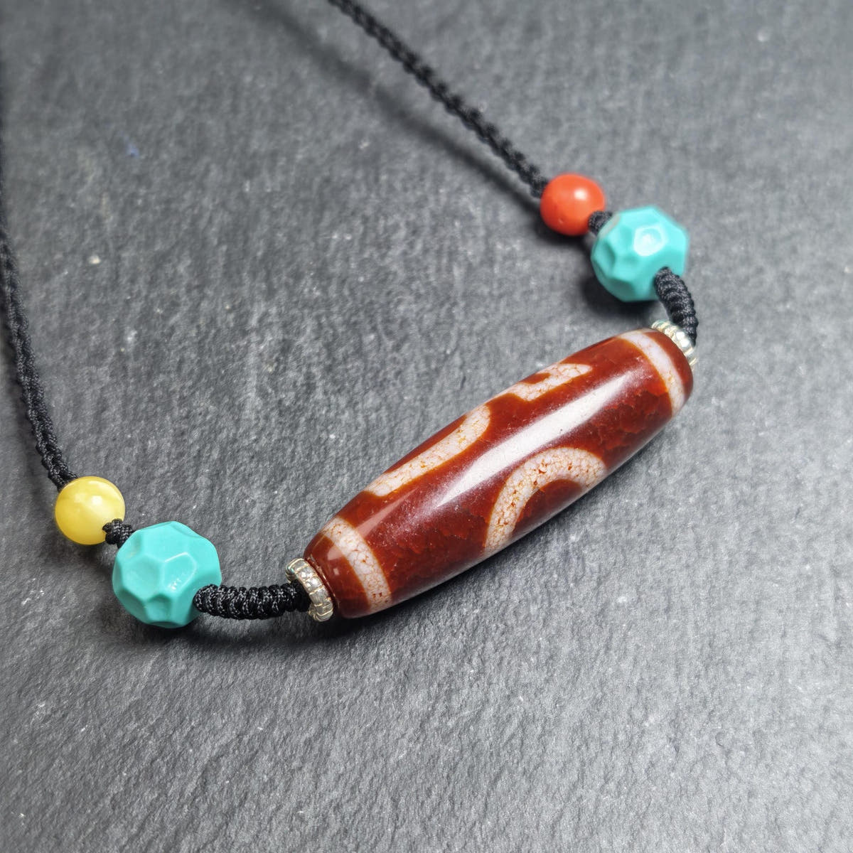 Authentic Fire Agate God of Wealth Dzi Necklace - Tibetan Buddhist bead necklace, close-up detail