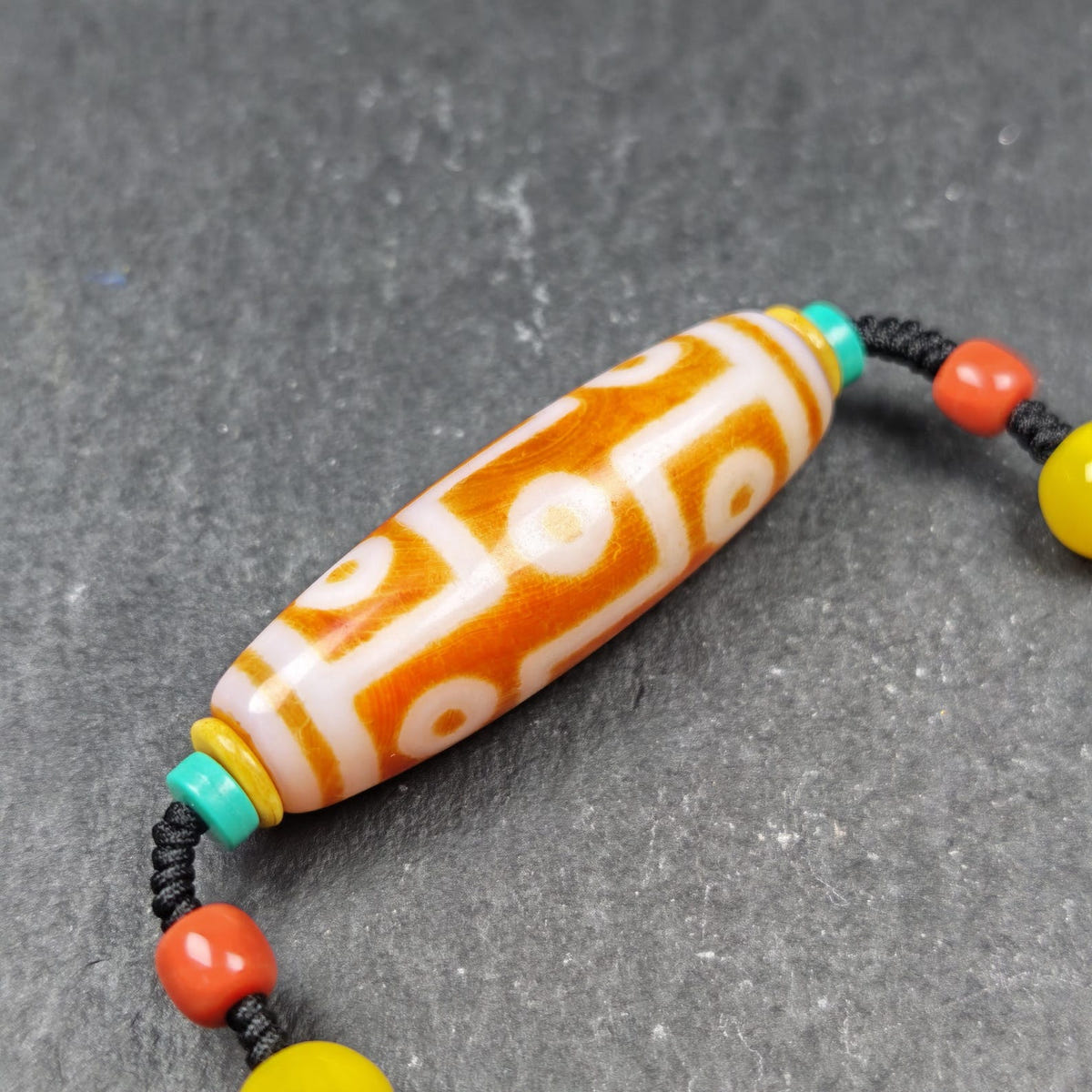 Fire Agate 9 Eyes Dzi Bead Necklace - Tibetan Buddhist bead necklace, detailed view