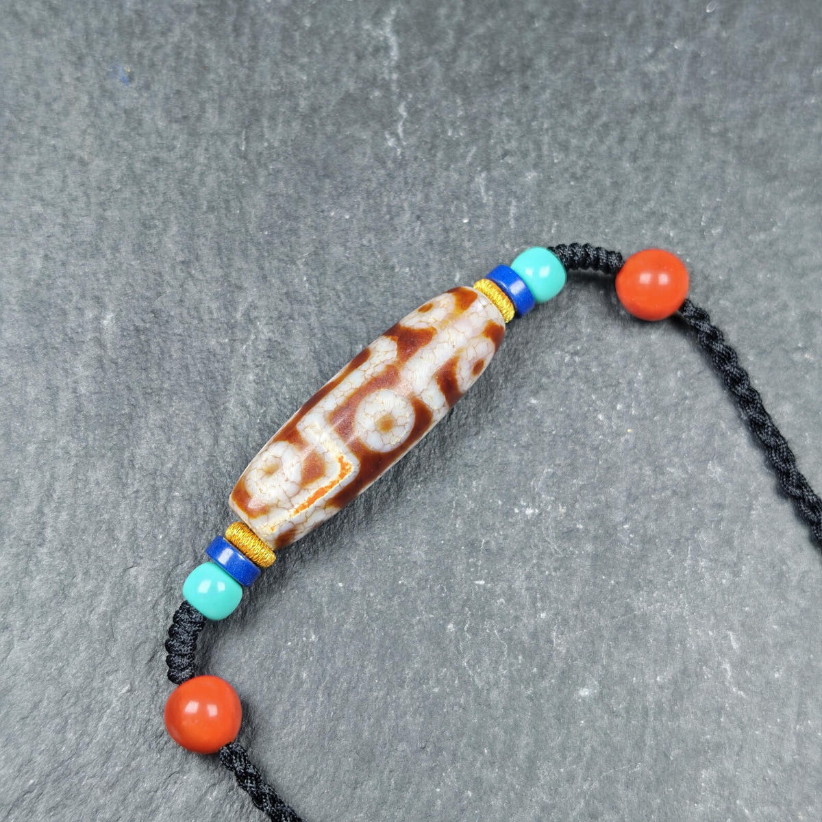 Fire Agate 9 Eye Dzi Bead Necklace - Tibetan Buddhist bead necklace, front view