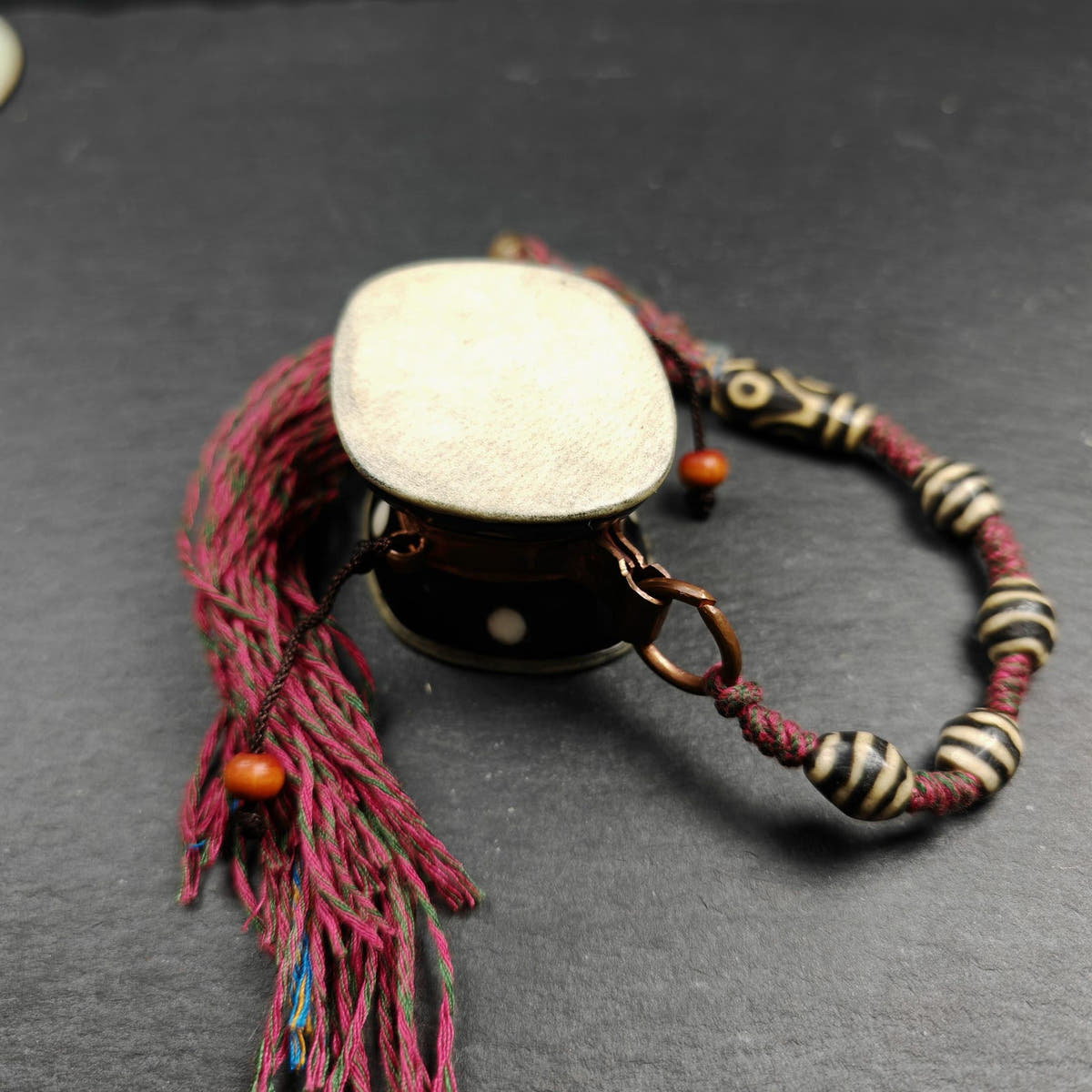 Portable Tibetan Chöd - Damaru Drum - Tibetan Buddhist art, close-up detail