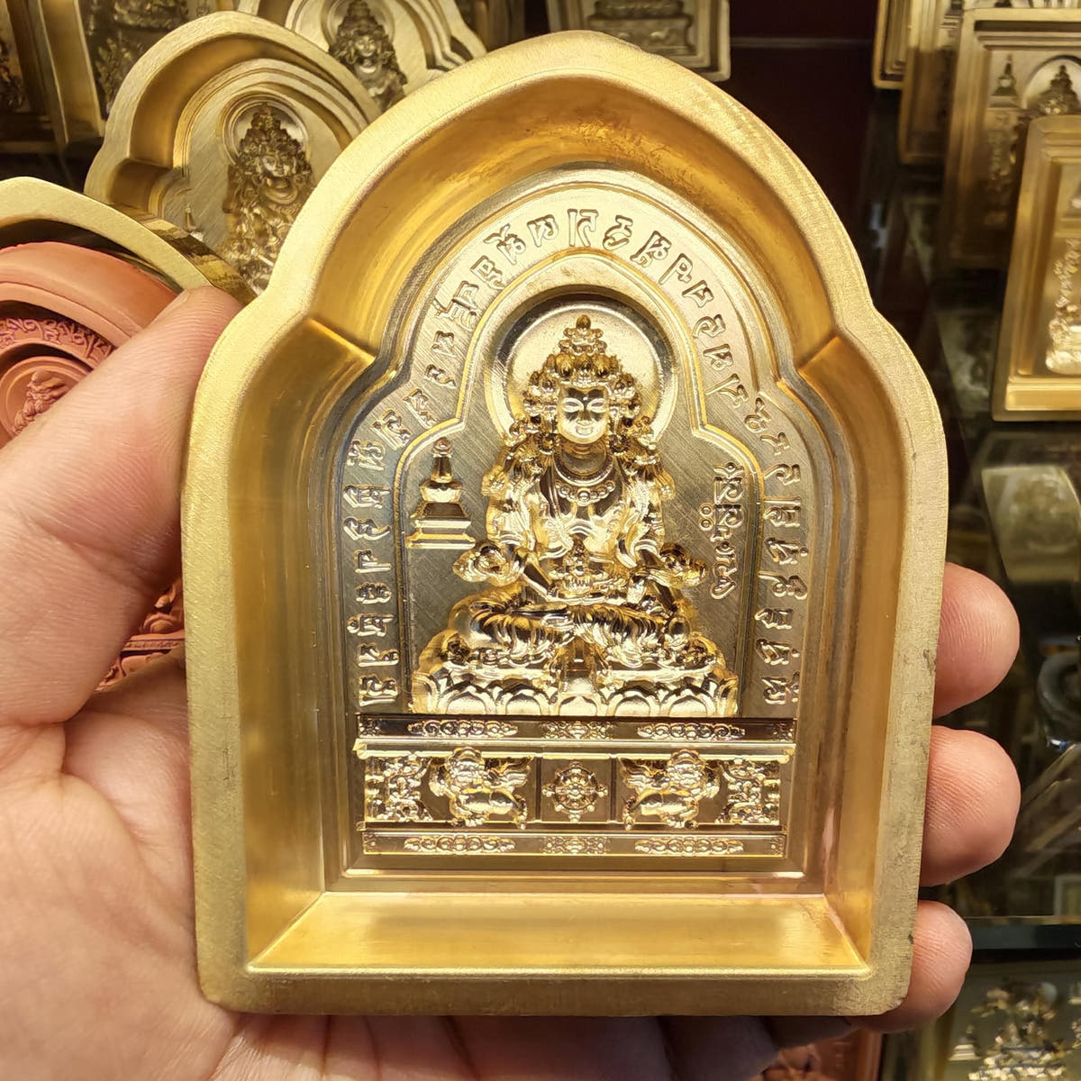 Bordered Ksitigarbha Tsa Tsa Mold - Tibetan tsa tsa mold, detailed view