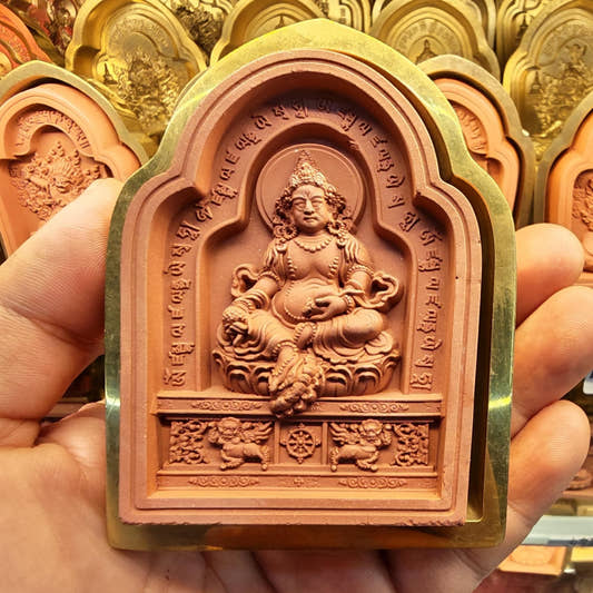 Bordered Yellow Jambhala Tsa Tsa Mold - Tibetan tsa tsa mold, front view