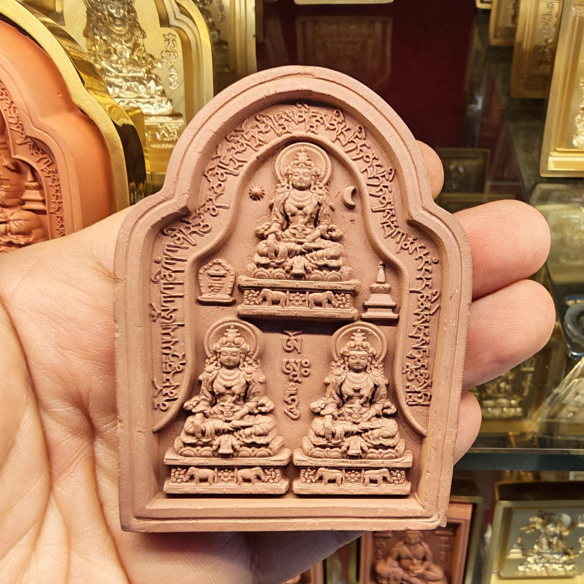 Bordered 3 Akshobhya Tsa Tsa Mold - Tibetan tsa tsa mold, close-up detail