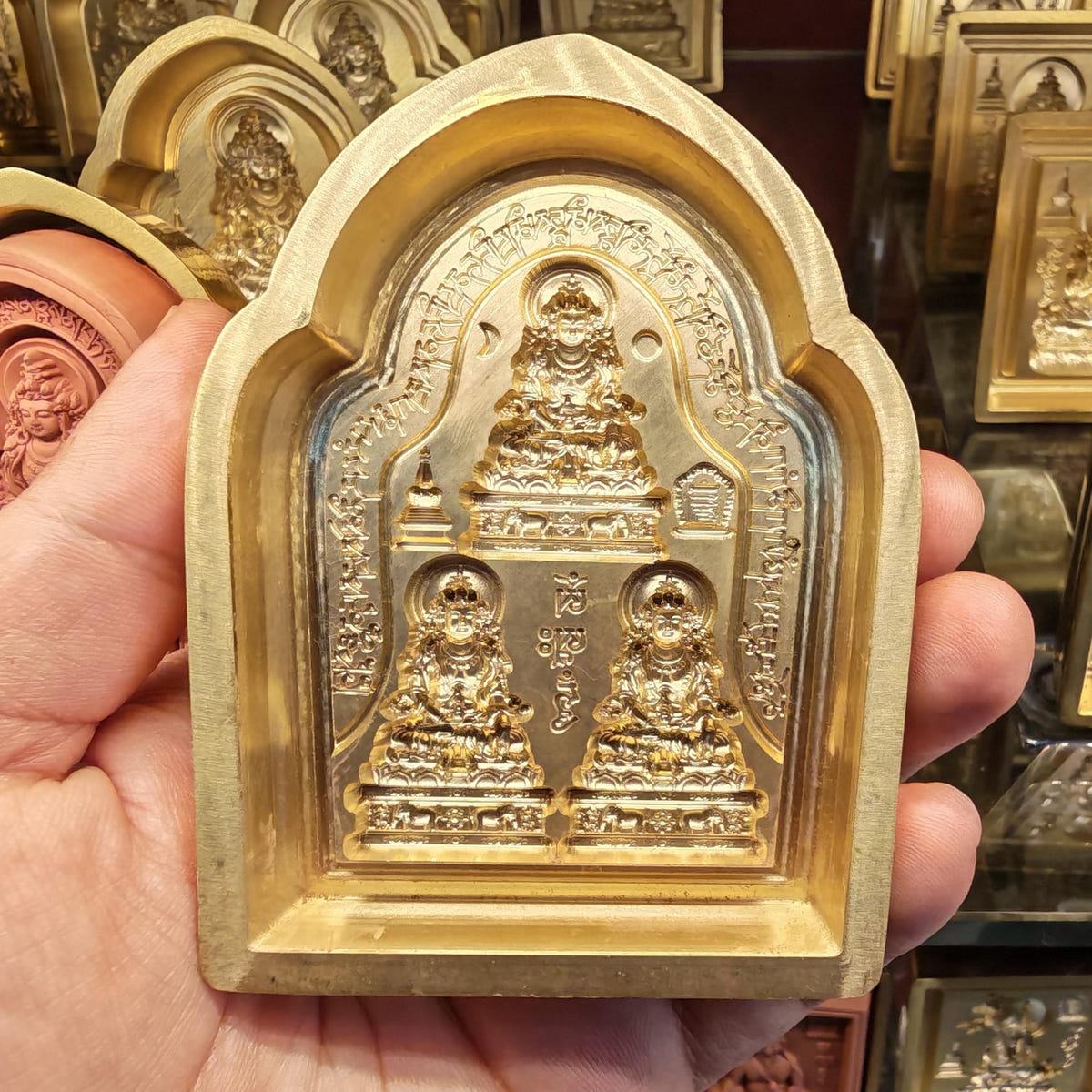 Bordered 3 Akshobhya Tsa Tsa Mold - Tibetan tsa tsa mold, detailed view