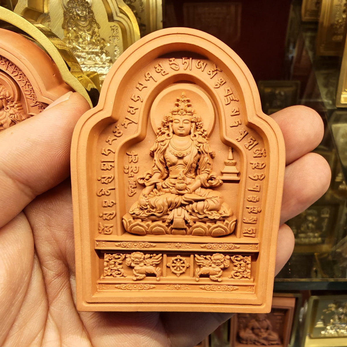 Bordered Ksitigarbha Tsa Tsa Mold - Tibetan tsa tsa mold, close-up detail