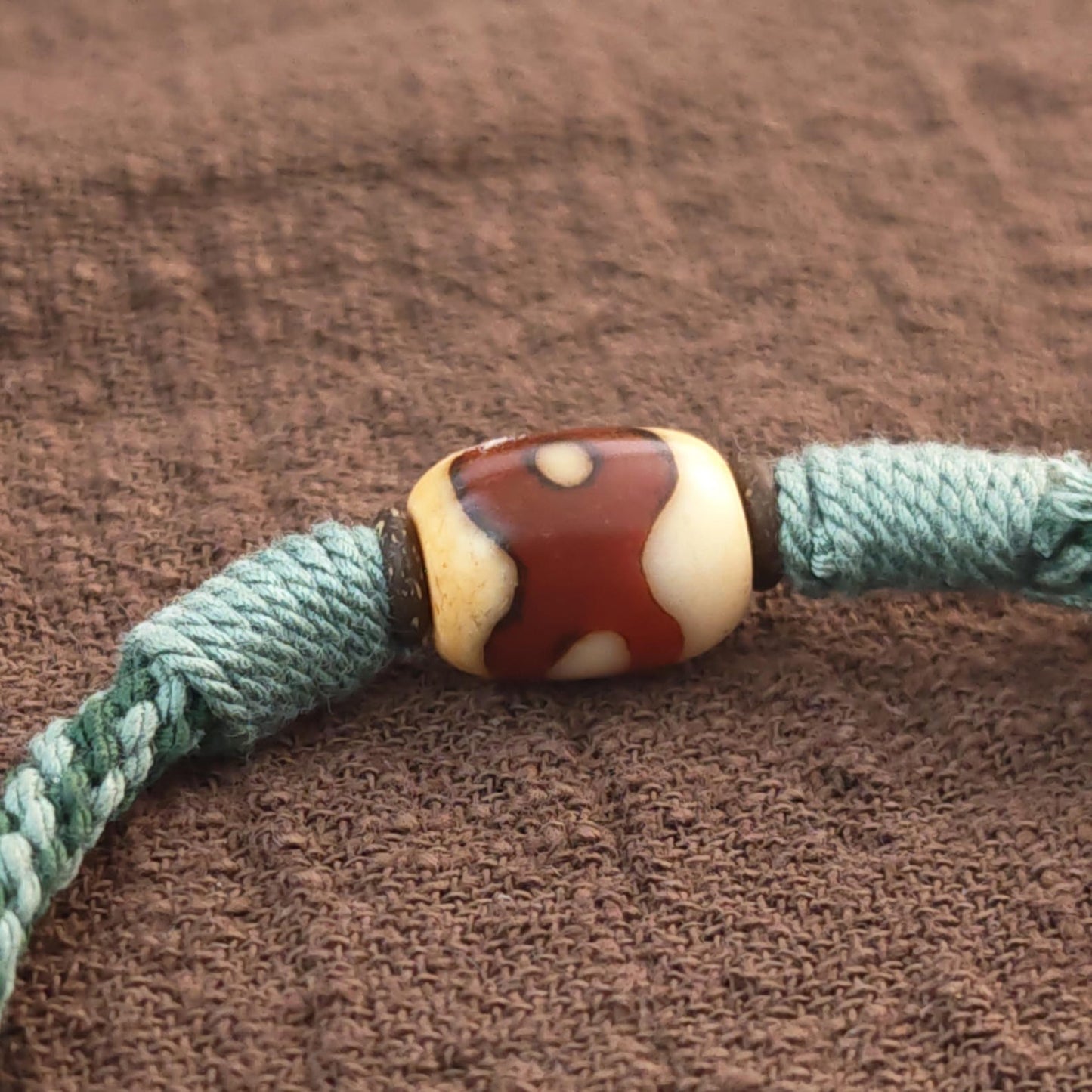 Hand Woven Bracelet with Fire Agate Tibetan 3 Eyes Mandala Dzi Beads
