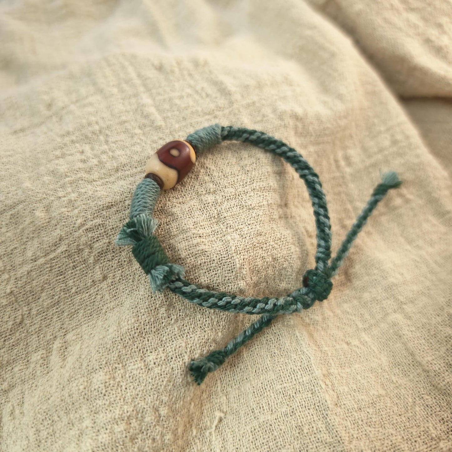 Hand Woven Bracelet with Fire Agate Tibetan 3 Eyes Mandala Dzi Beads