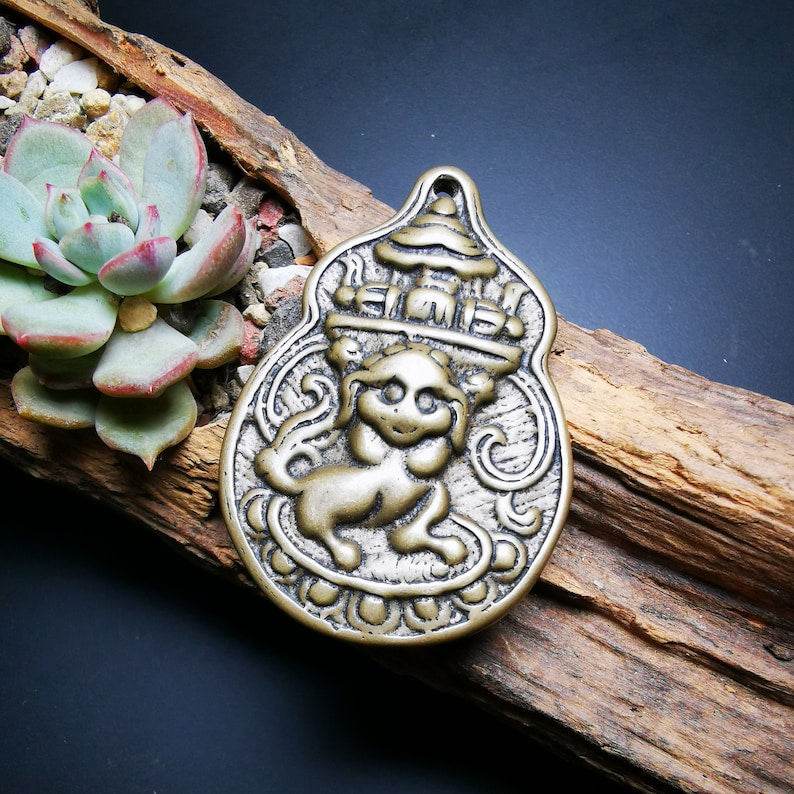 Buddhist Protective Pendant,Snow Lion Amulet Badge - Tibetan Buddhist amulet, front view
