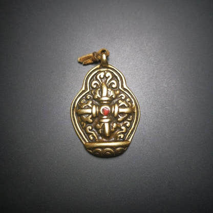 Buddhist Protective Pendant,Cross Vajra Amulet, 50 years old - Tibetan Buddhist amulet, close-up detail