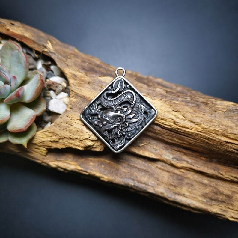 Amulet,Dragon -the Four Dignities - Tibetan Buddhist amulet, detailed view