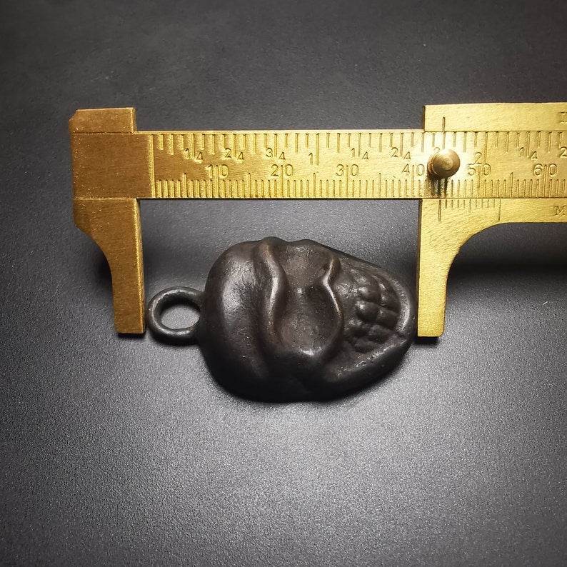 Skull Sītavana Amulet,Smasana Adhipati Pendant,Made of Thokcha - Tibetan Buddhist amulet, size reference