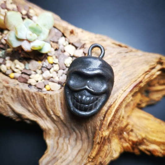 Skull Sītavana Amulet,Smasana Adhipati Pendant,Made of Thokcha - Tibetan Buddhist amulet, front view
