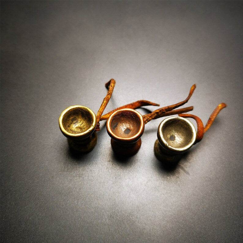 Amulet Pendant,Butter lamp Pendant - Tibetan Buddhist amulet, close-up detail
