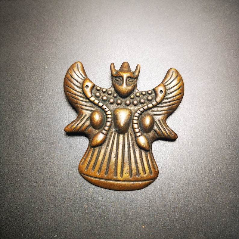 Tibetan Buddhist Amulet,Garuda,Golden-winged Bird Pendant - Tibetan Buddhist amulet, close-up detail